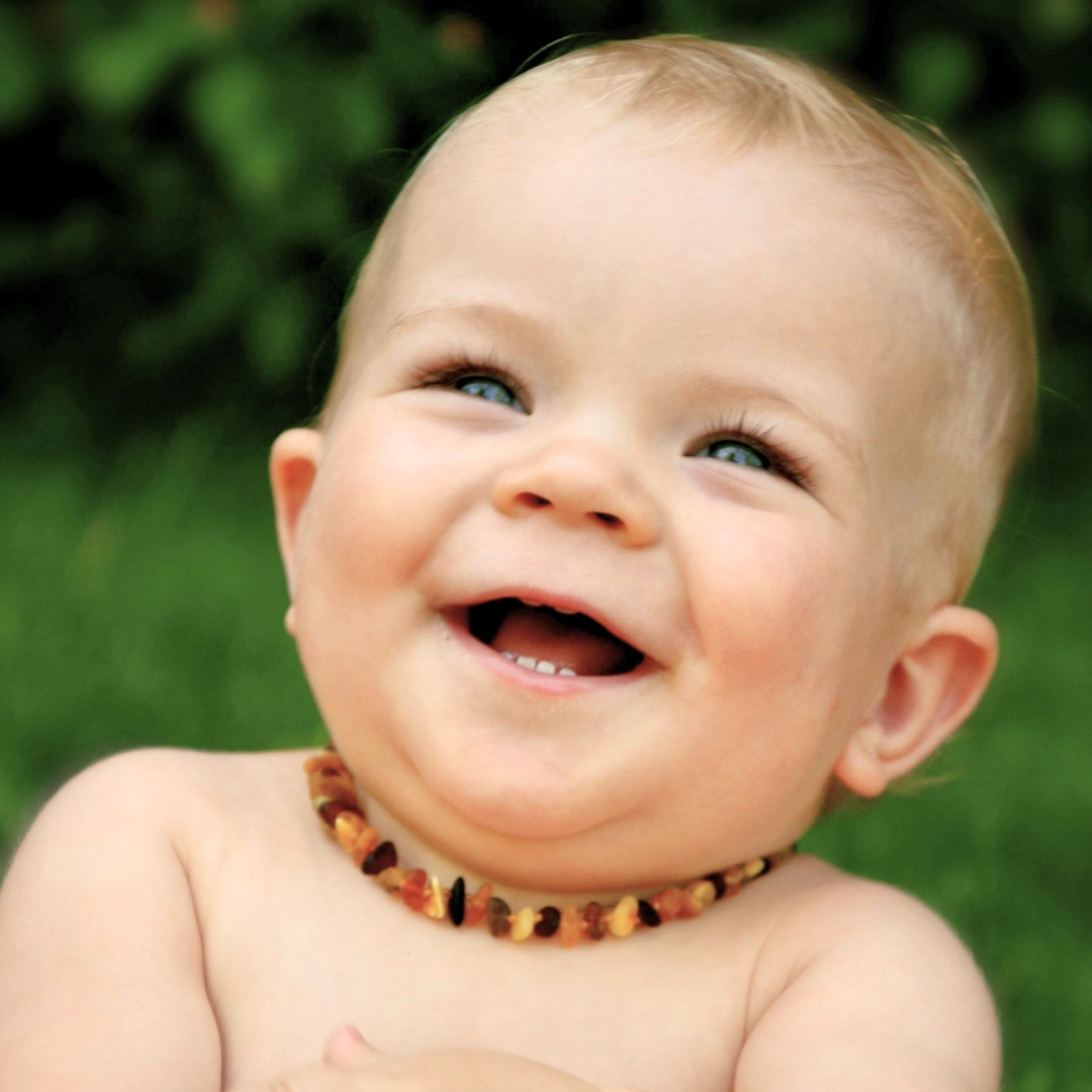 bebe souriant ambre