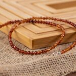 collier hessonite facettes 4mm