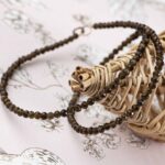 collier obsidienne dorée facettes 3mm